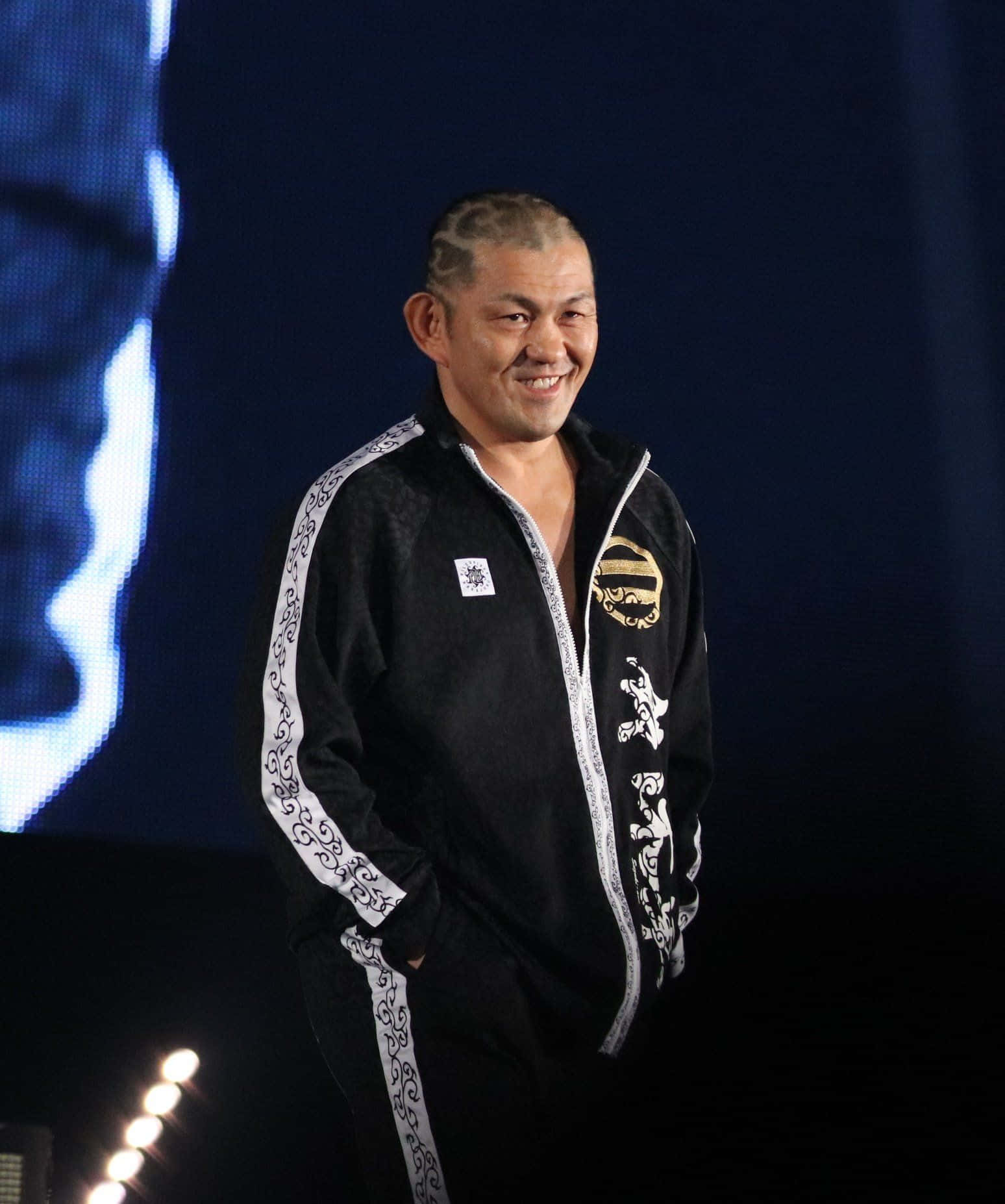 Minoru Suzuki Smiling Wrestler Background