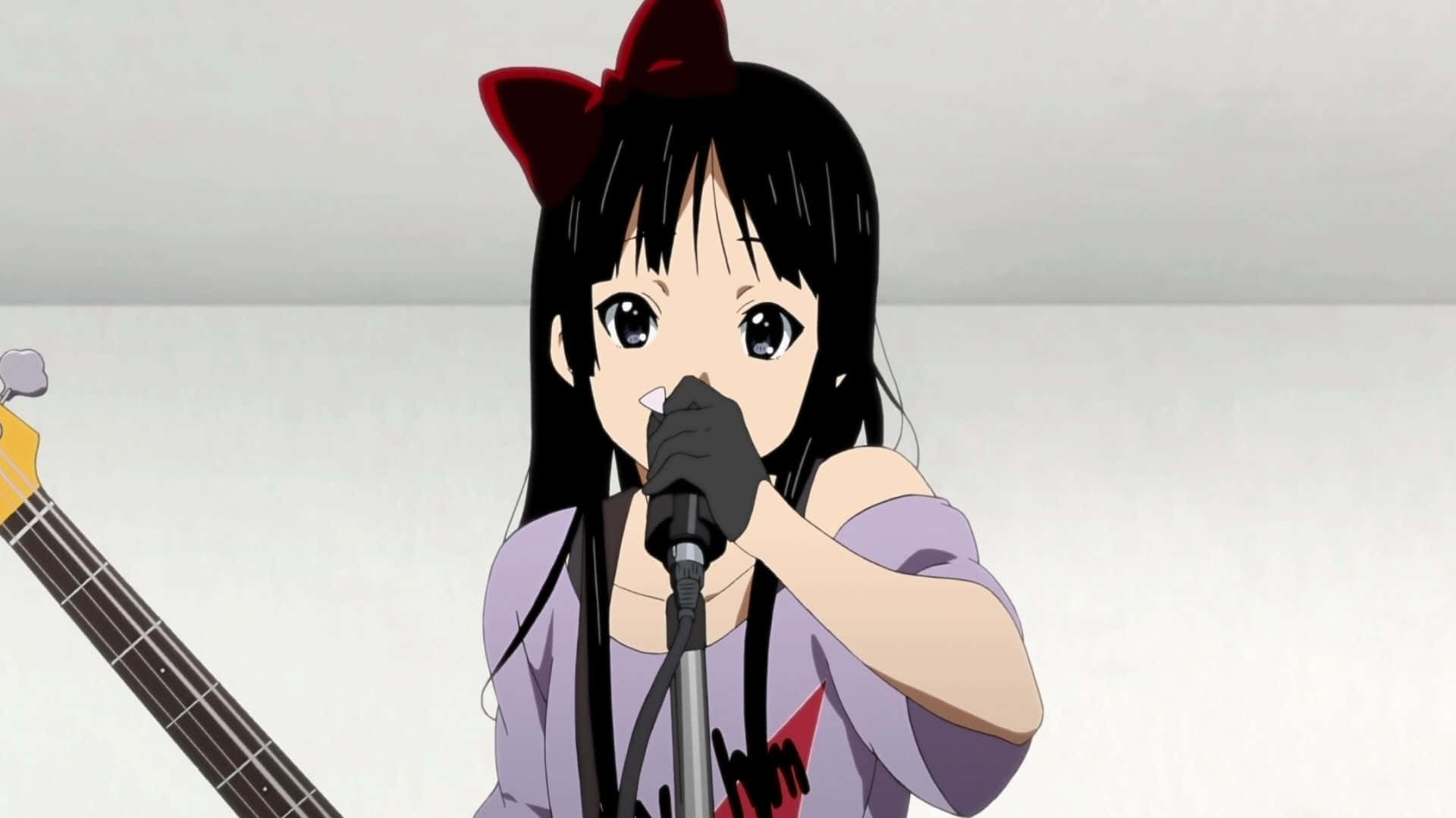 Mio Akiyama Playing Bass In Concert Background