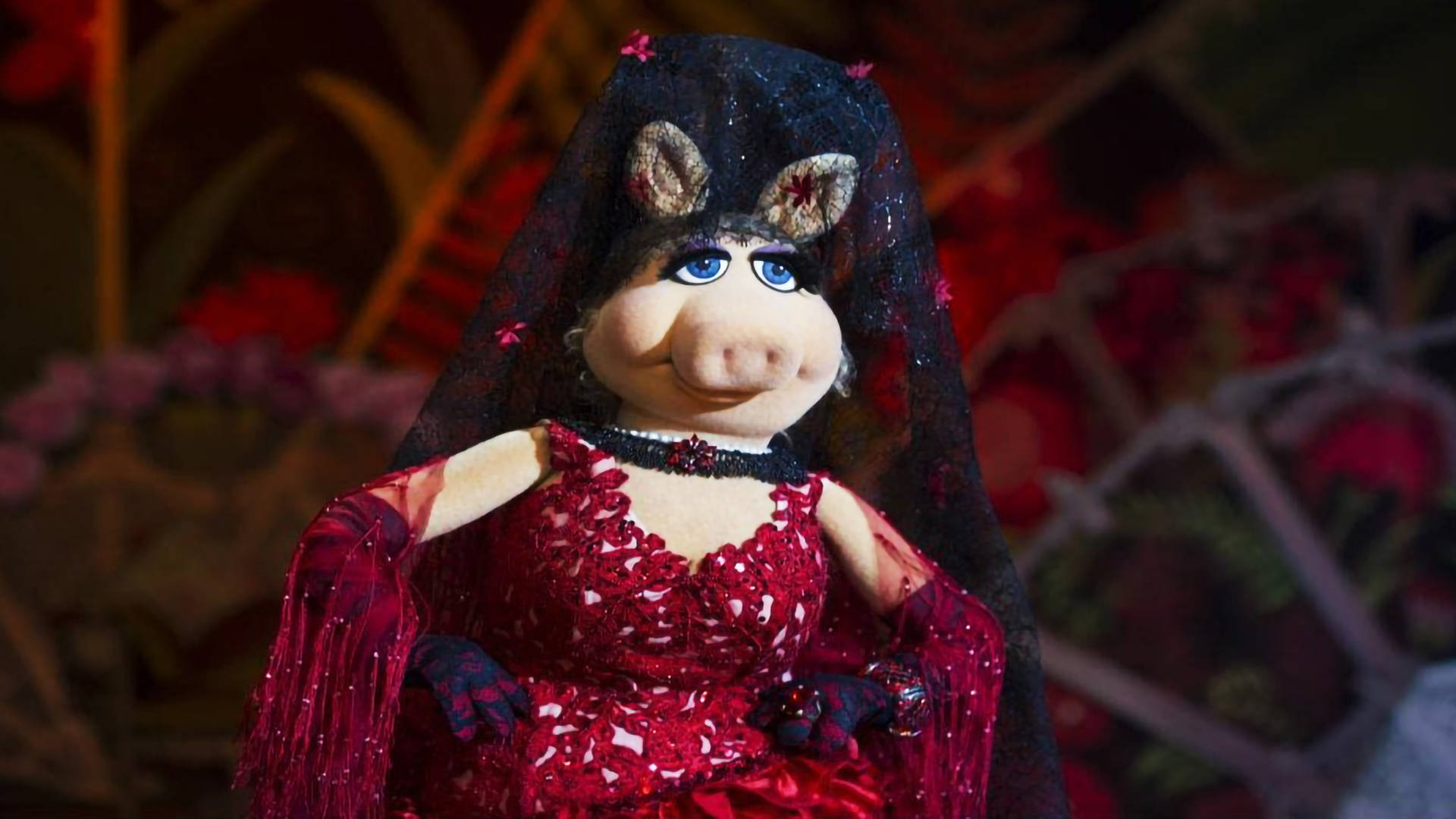 Miss Piggy In A Stellar Performance During An Opera Scene In Muppets Most Wanted. Background