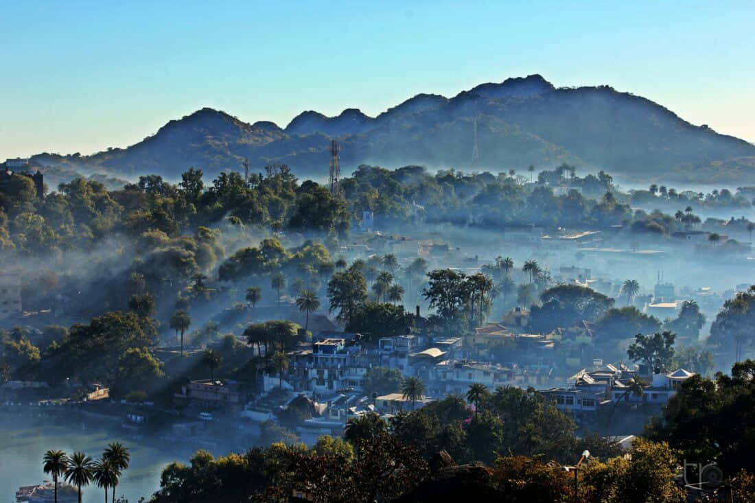Misty Mountain Morning Townscape Background