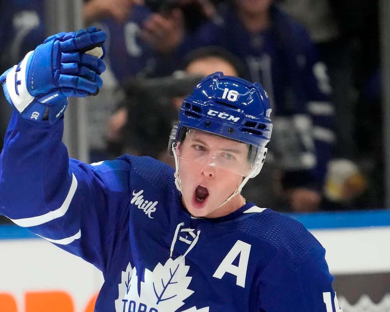 Mitchell Marner In Celebratory Pose After Victory Background
