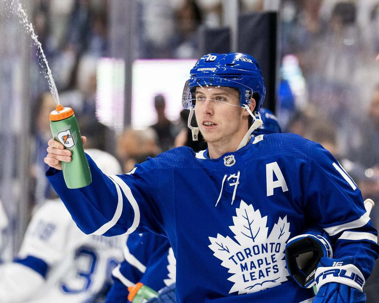 Mitchell Marner Squeezing A Gatorade Bottle During A Game