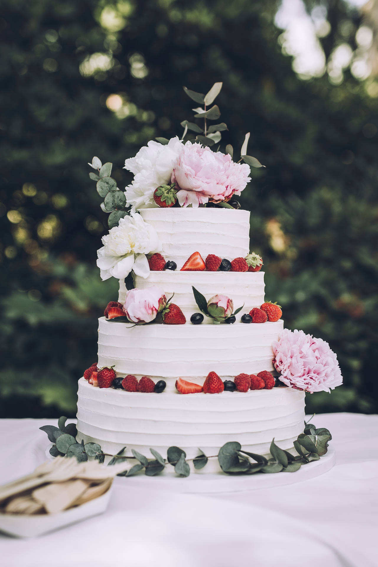 Mixed Berries Roses Wedding Cake Background