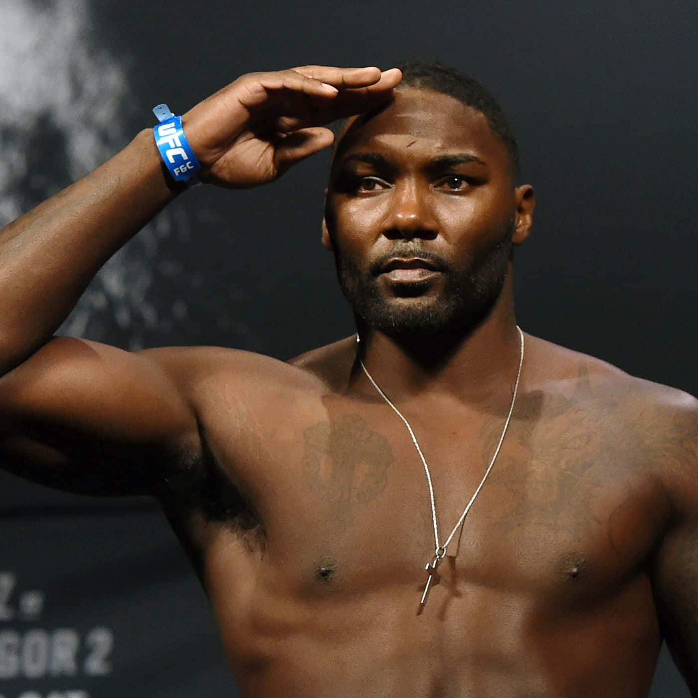 Mixed Martial Artist Anthony Johnson Salutes In 2016 Weigh In Background