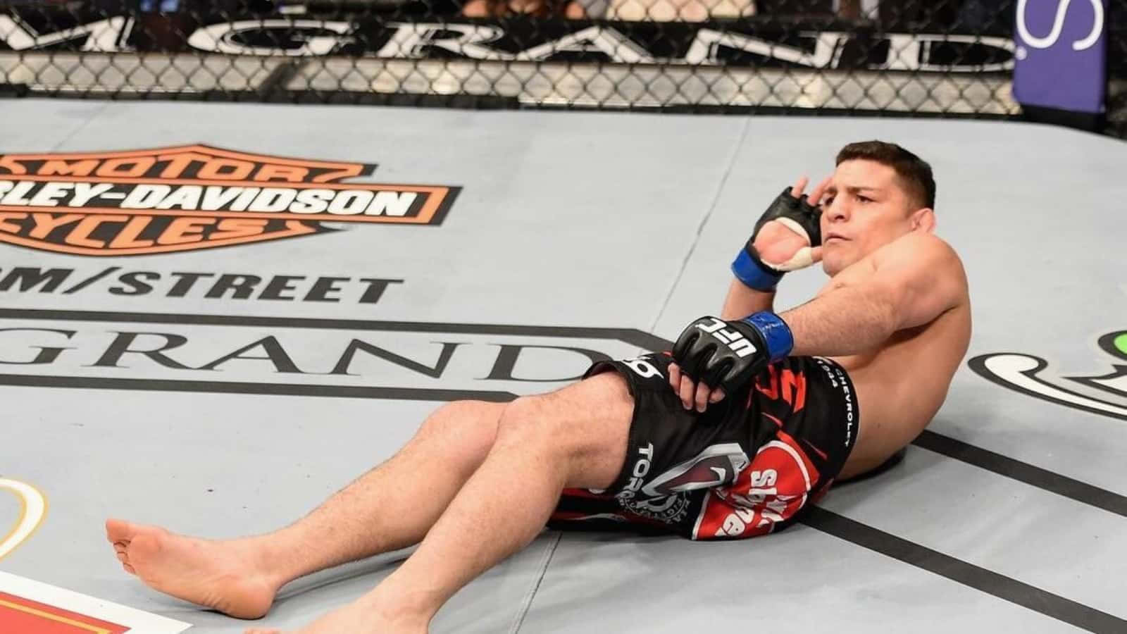 Mixed Martial Artist Nick Diaz Taunting His Enemy Background