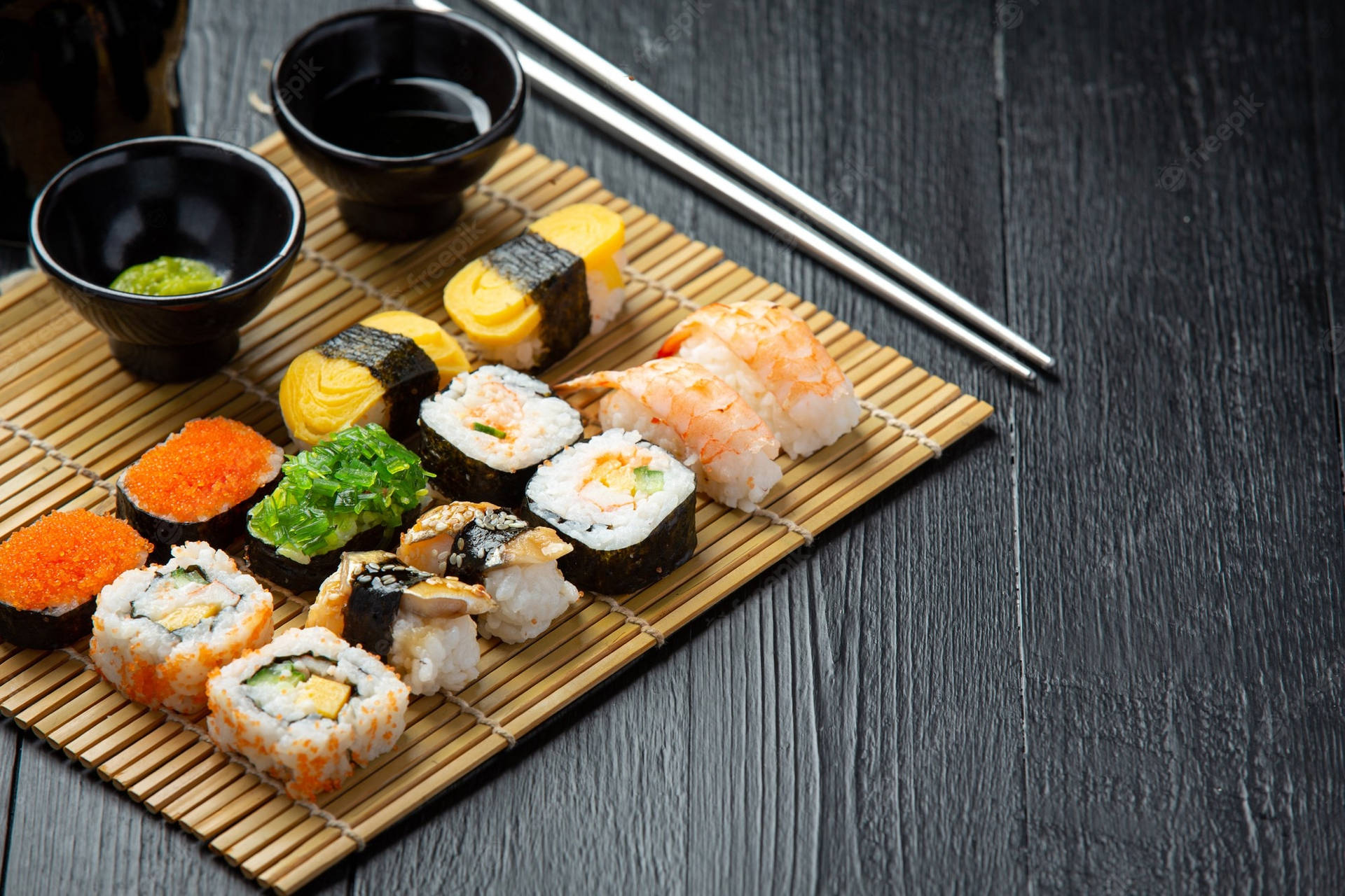 Mixed Sashimi On Bamboo Mat Background