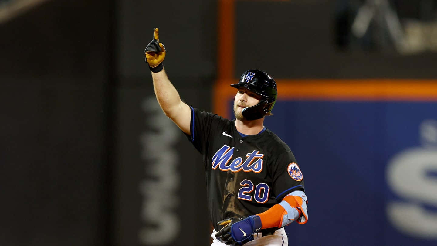 Mlb Slugger Pete Alonso Powers A Home Run Background