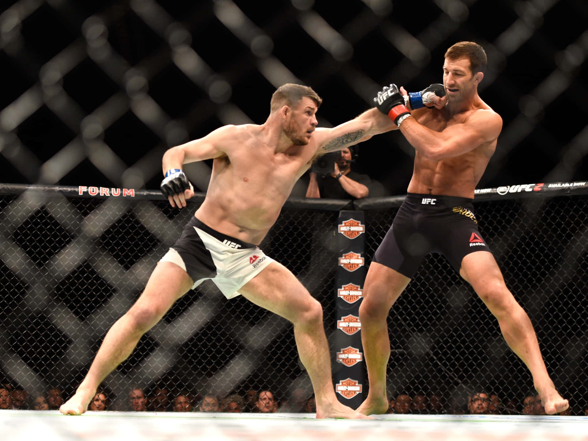 Mma Athlete Michael Bisping And Luke Rockhold Match Background