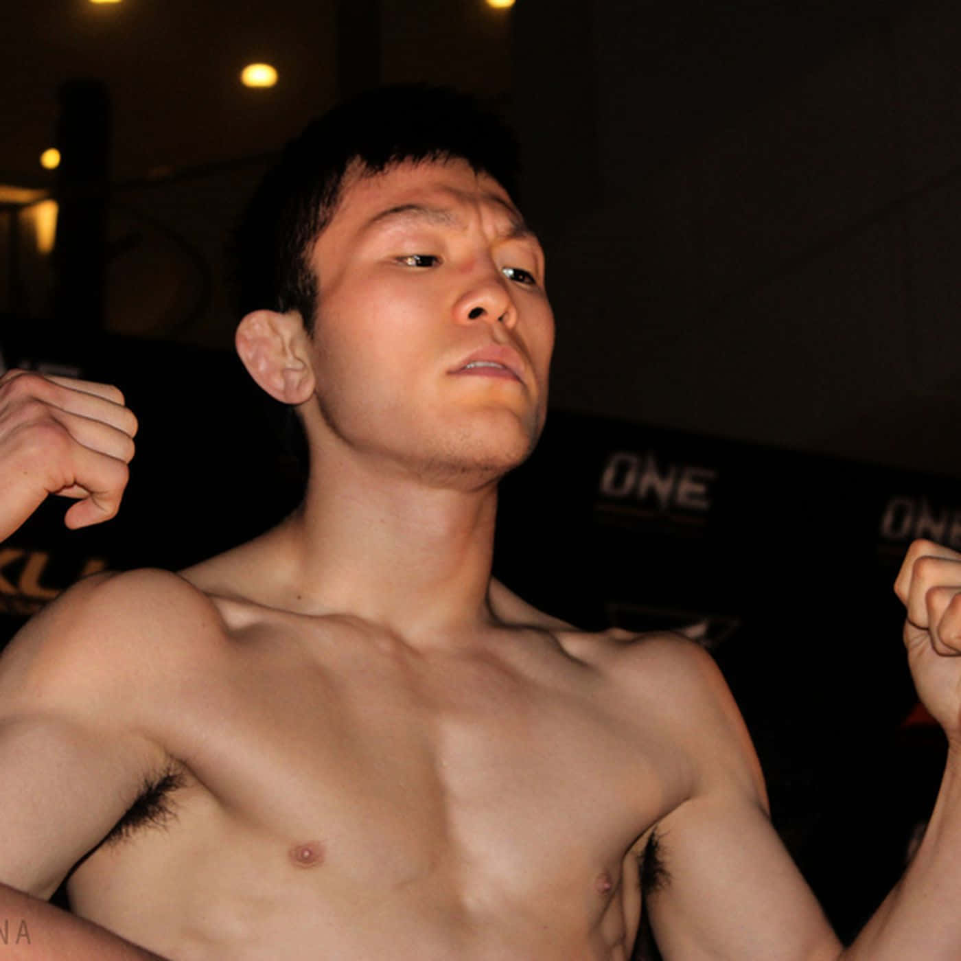 Mma Champion Shinya Aoki Showcasing Strength Background