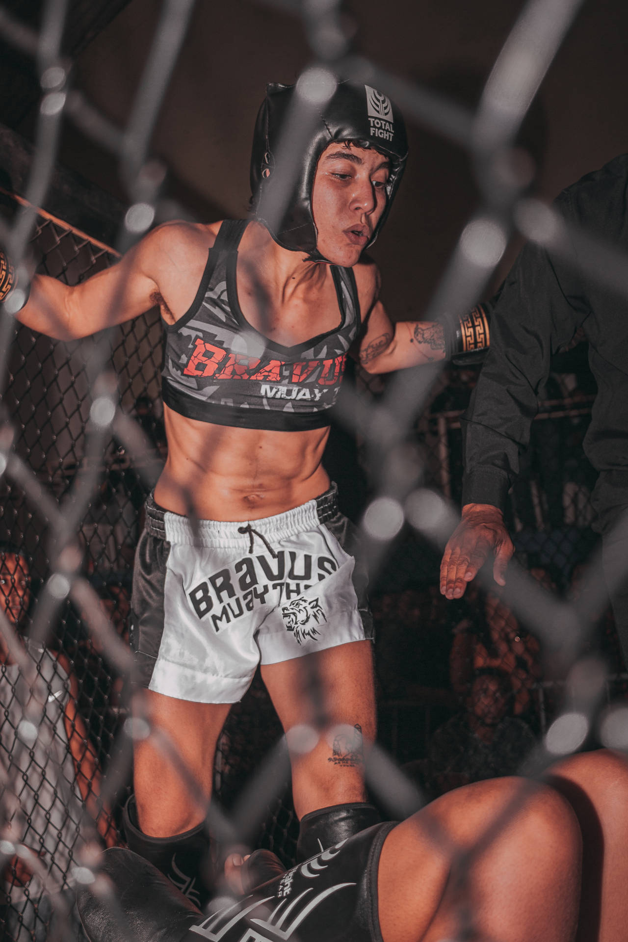 Mma Female Fighter In Gear Background