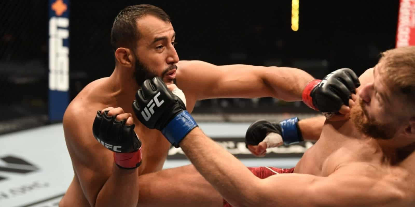 Mma Fighter Dominick Reyes In Action Background