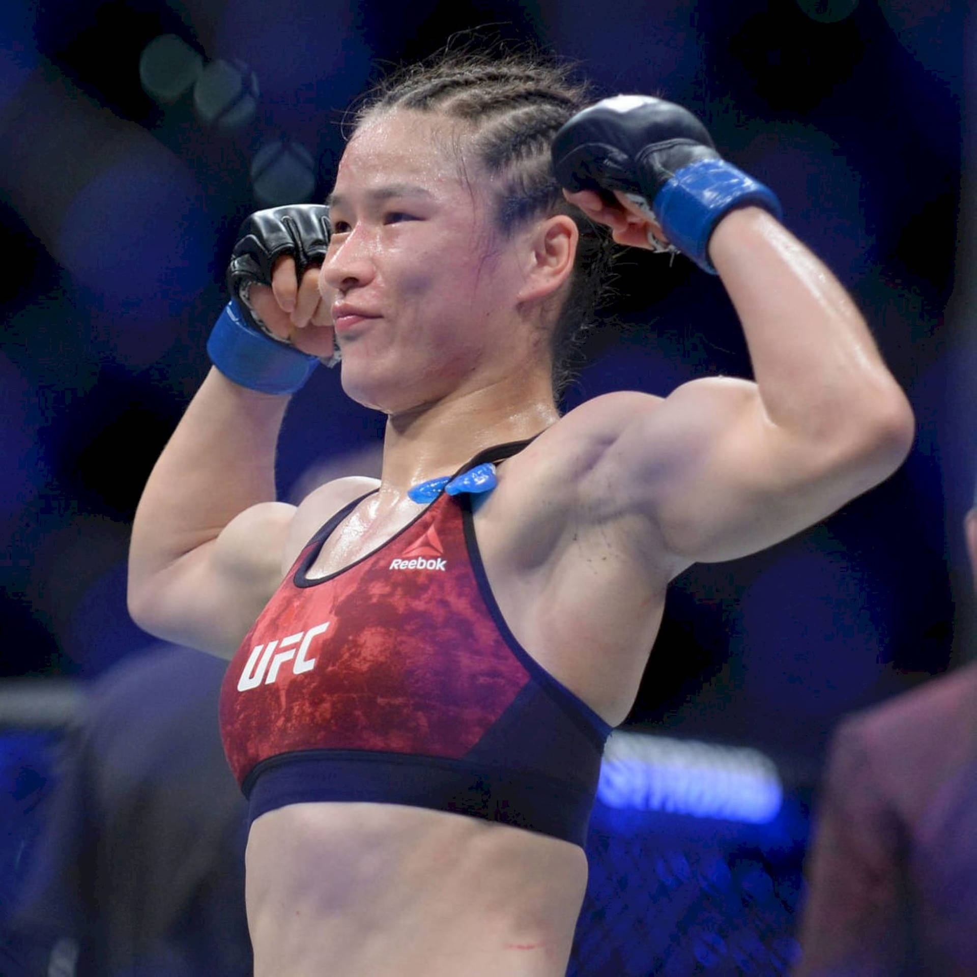 Mma Fighter Zhang Weili Standing Strong Background