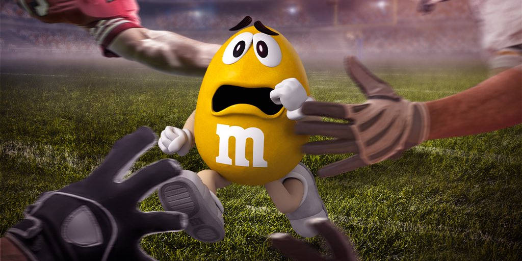 Mms Yellow On Football Field Background