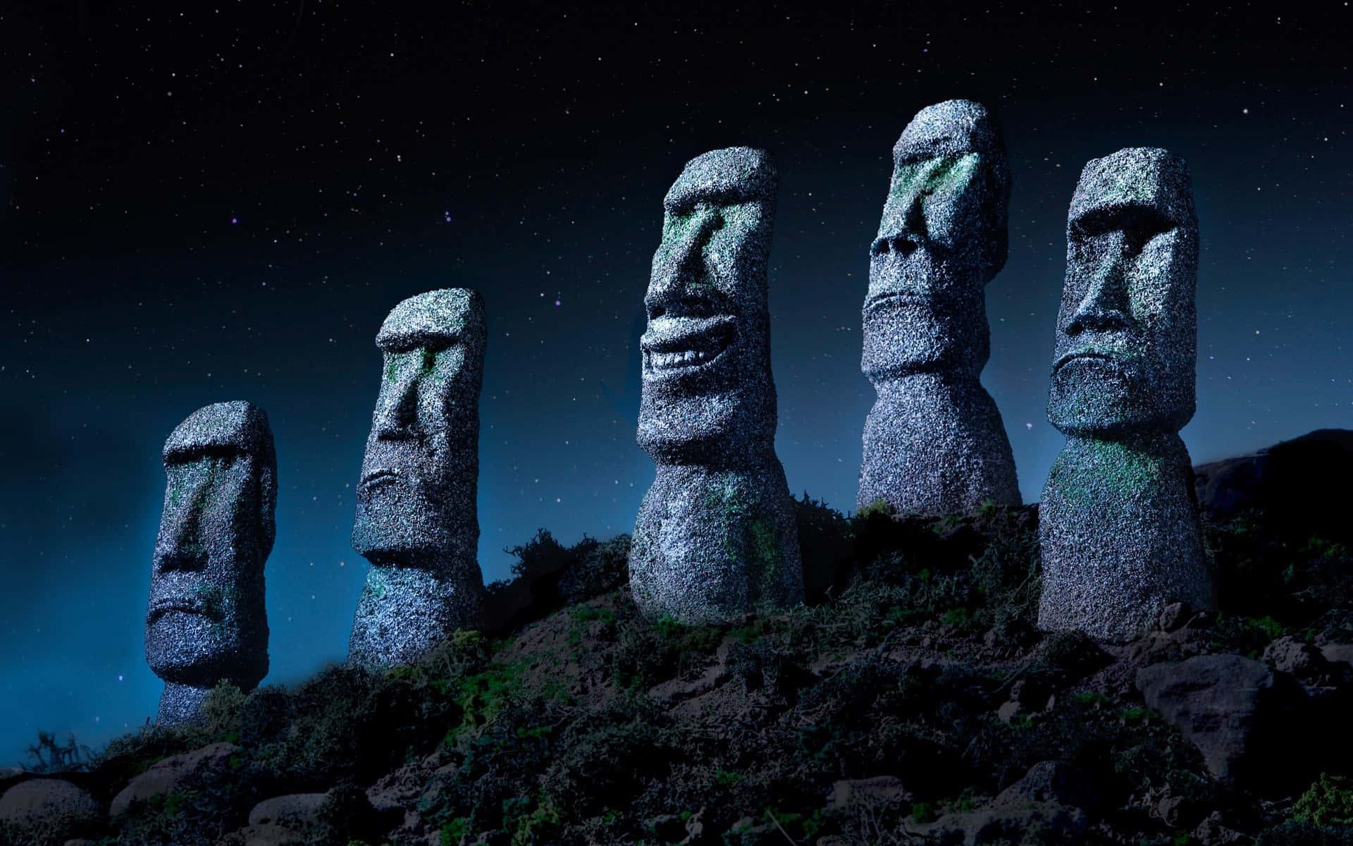 Moai Sculptures With Different Expressions Background