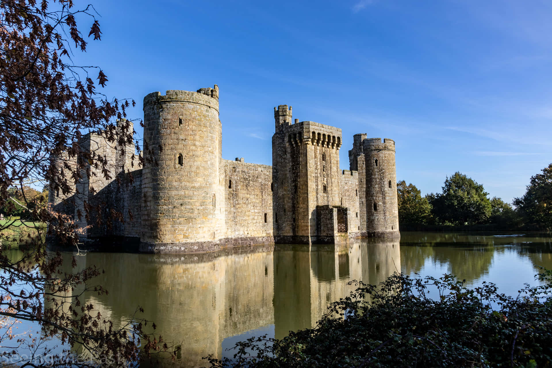 Moated Bodiam Castle In England Panorama Shot Background