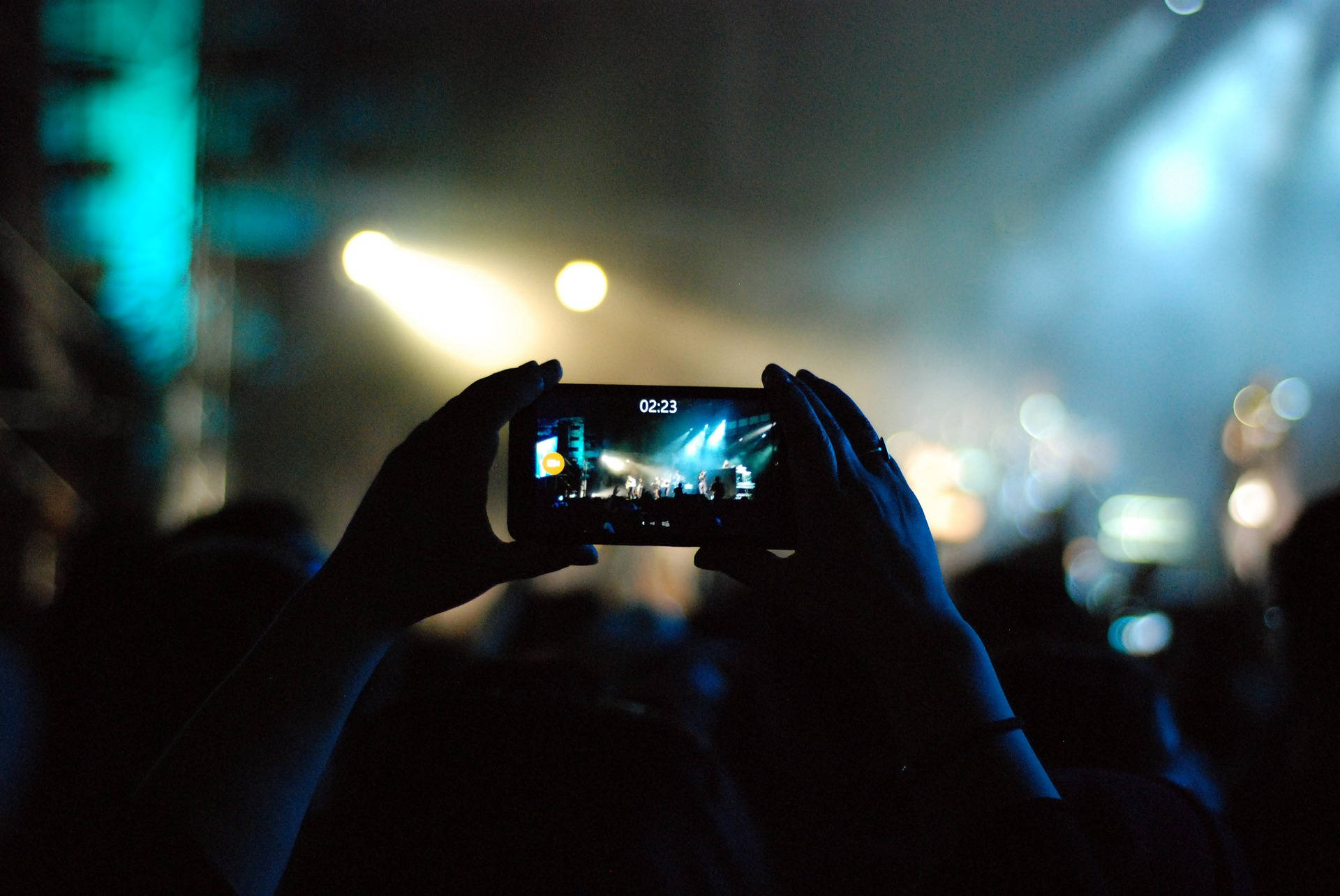 Mobile Phone Capturing Concert Moments