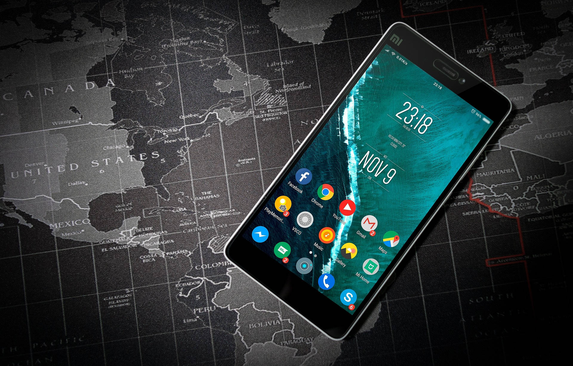 Mobile Phone On A Travel Map Background