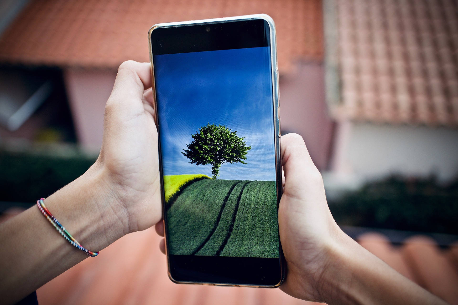 Mobile Phone Tree In A Field Background