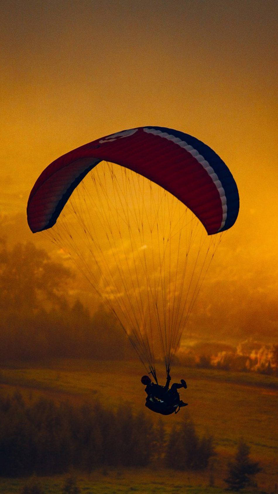 Mobile Sunset Parasailing Background