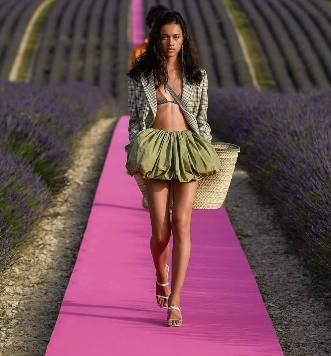 Model In Green Jacquemus Outfit Background