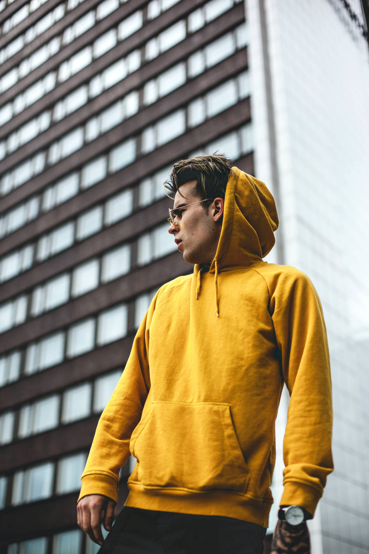Model In Yellow Hoodie Background