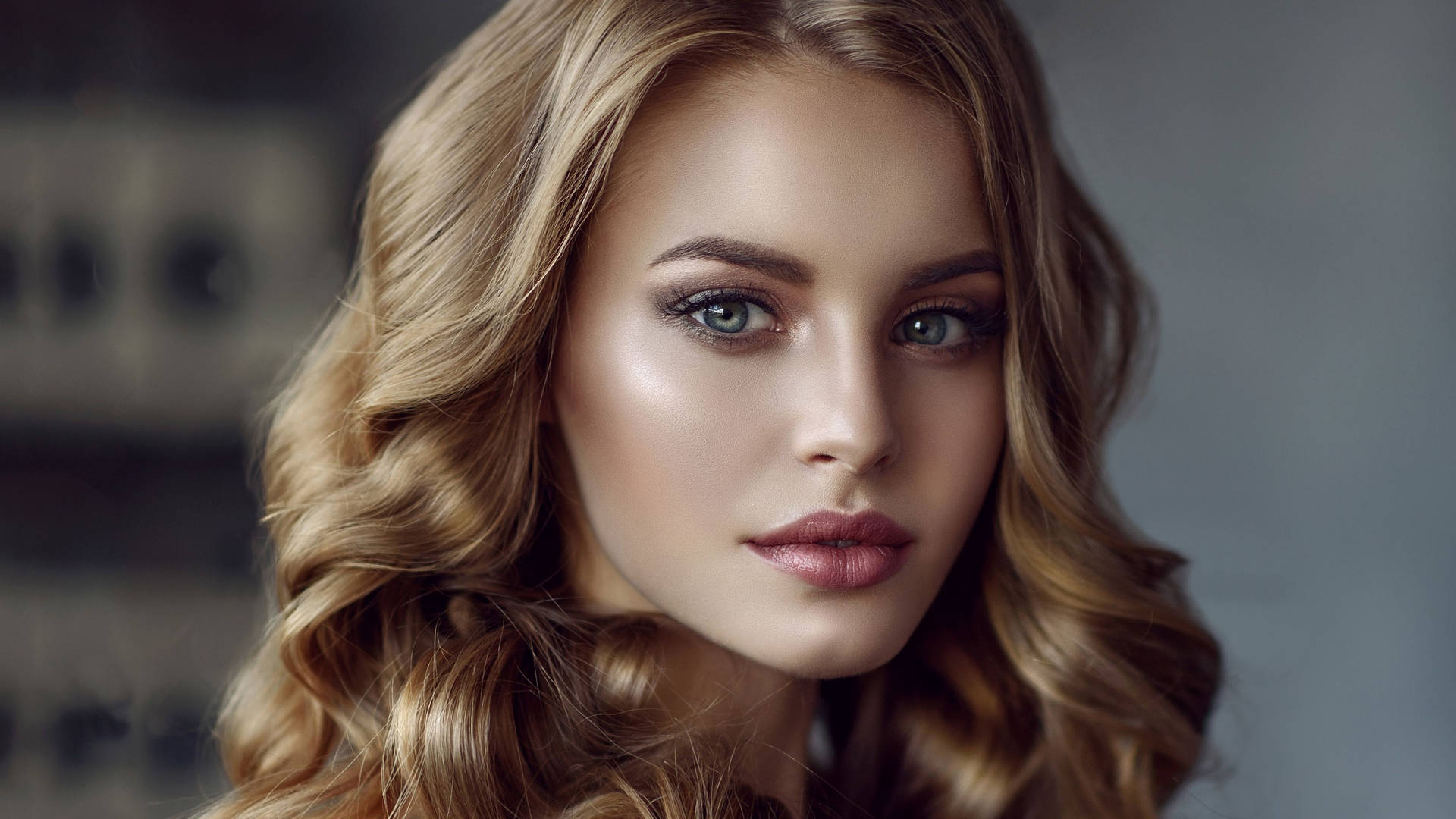 Model's Face With Blonde Hair Background