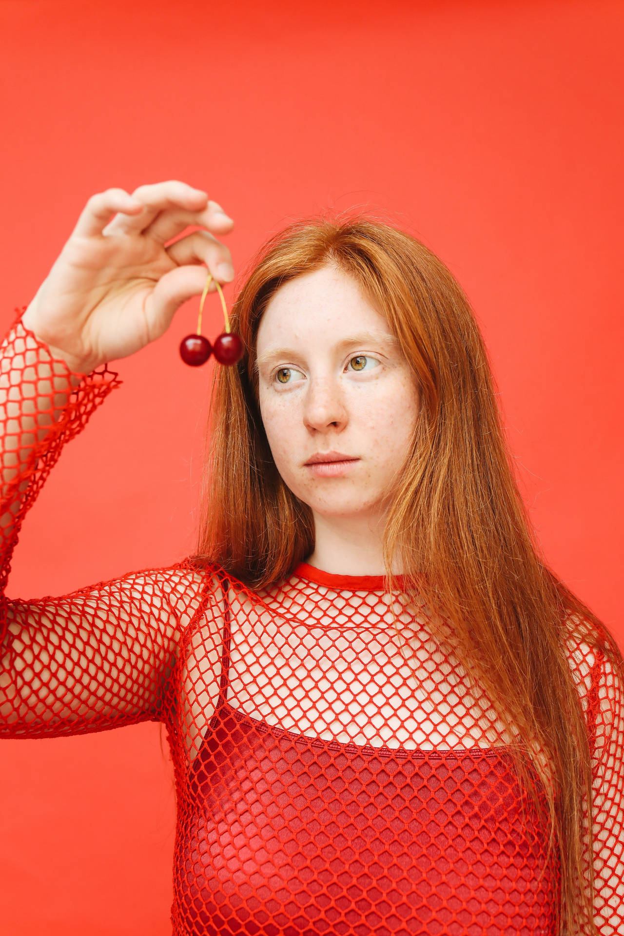 Model With Red Cherry Background