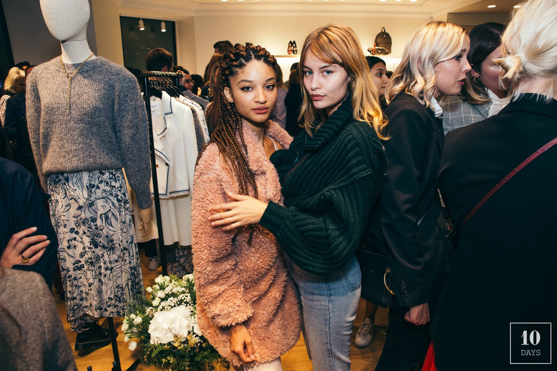 Models In Claudie Pierlot Store Background