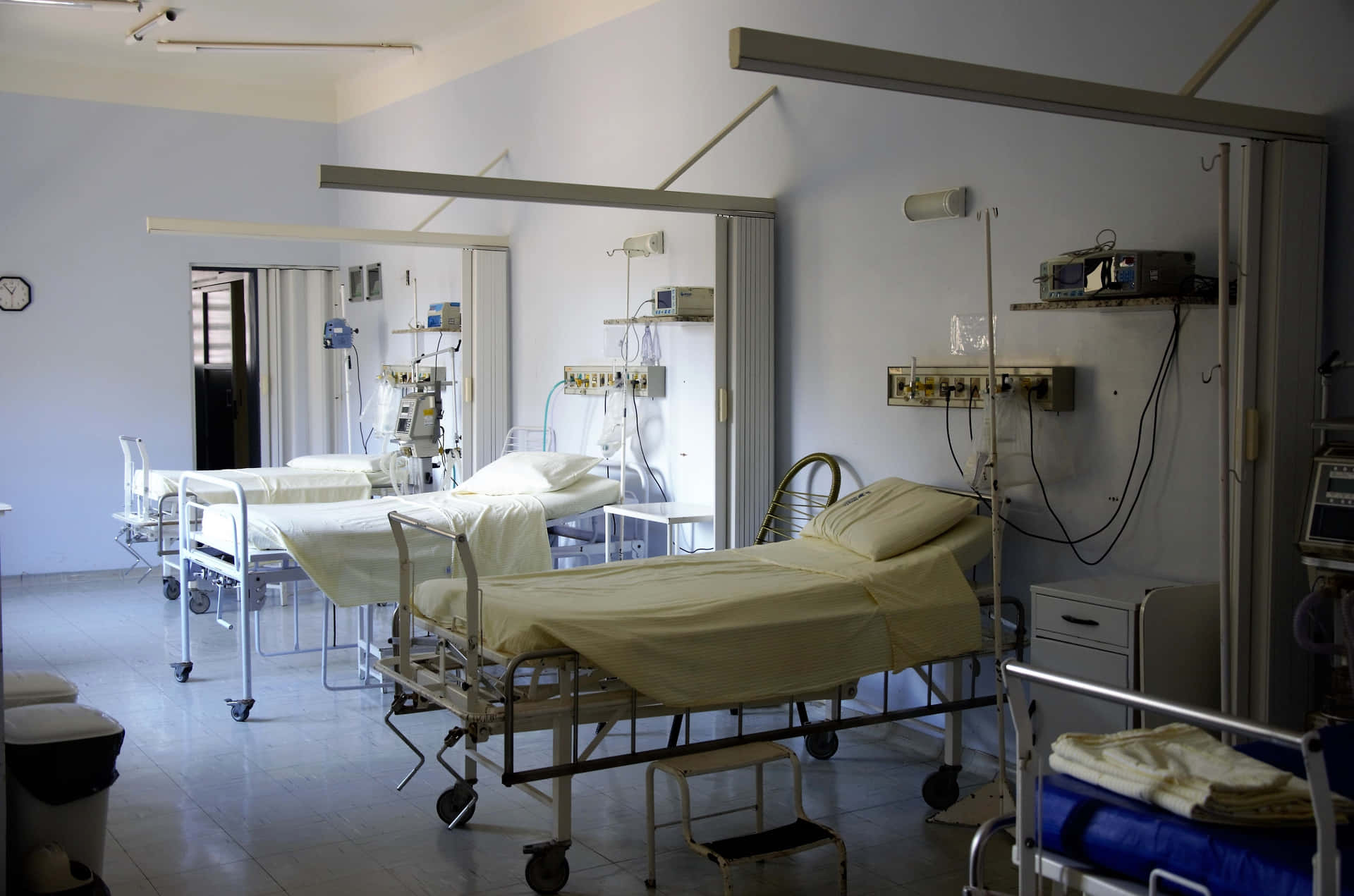 Modern Hospital Bed In An Emergency Room Background