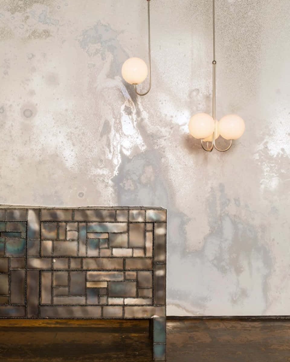 Modern Interiorwith Tiled Sofaand Pendant Lights Background