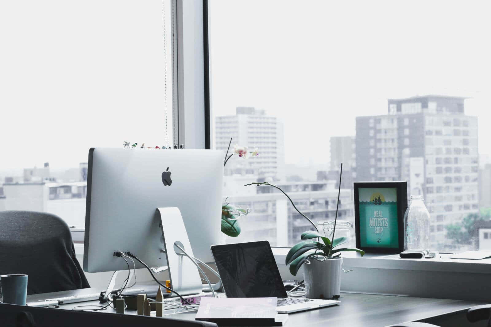 Modern Office Deskwith City View Background
