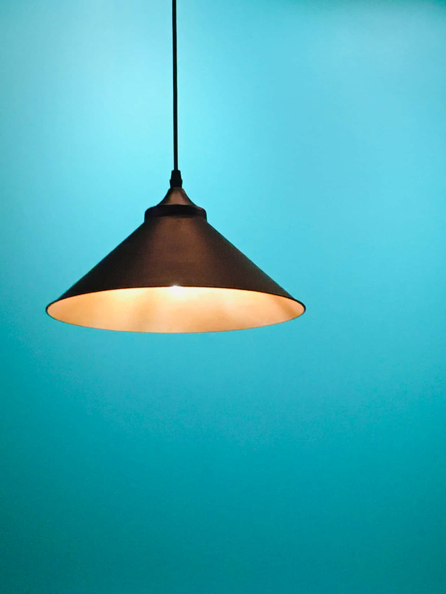 Modern Pendant Light Against Blue Background Background