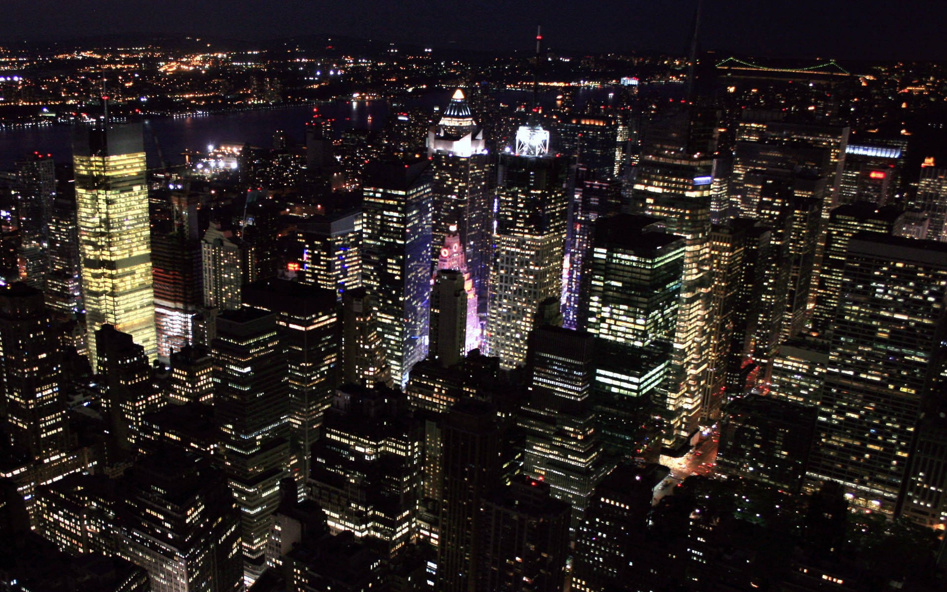 Modern Tall Building New York City At Night Background