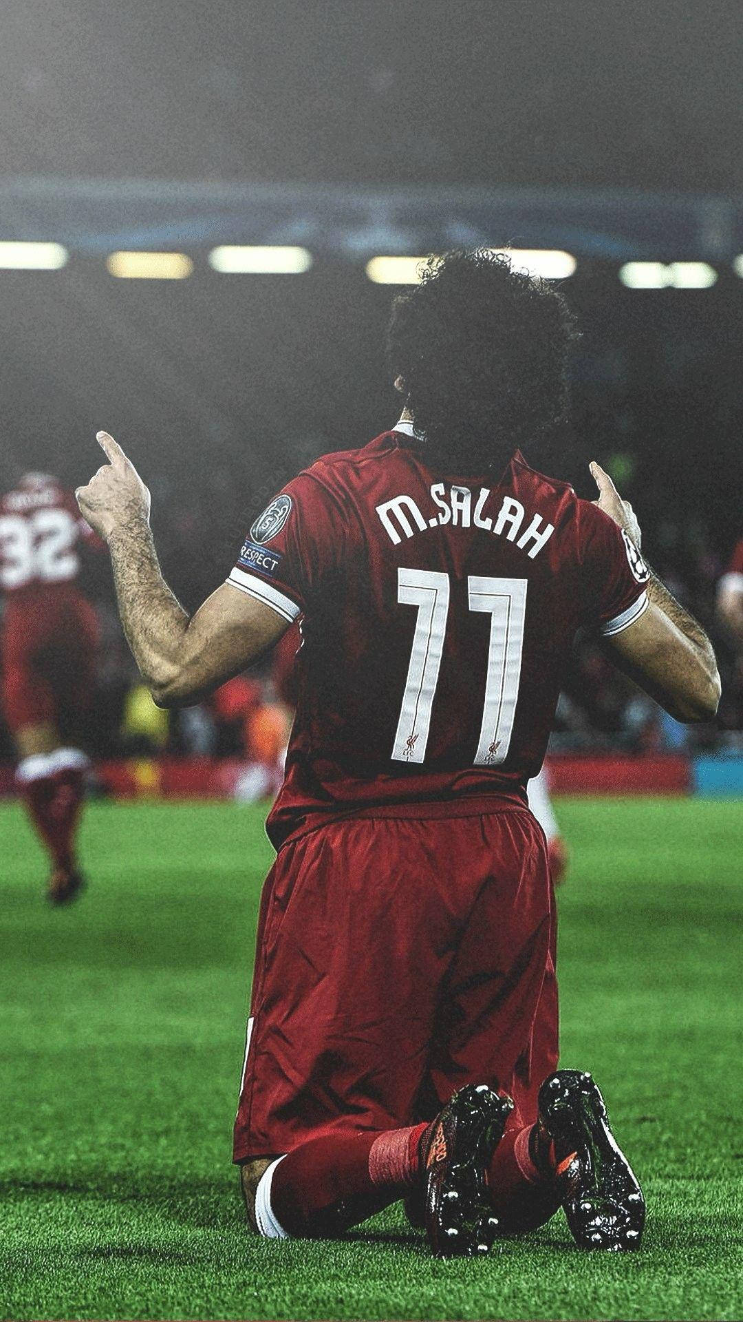 Mohamed Salah Kneeling Pose Background