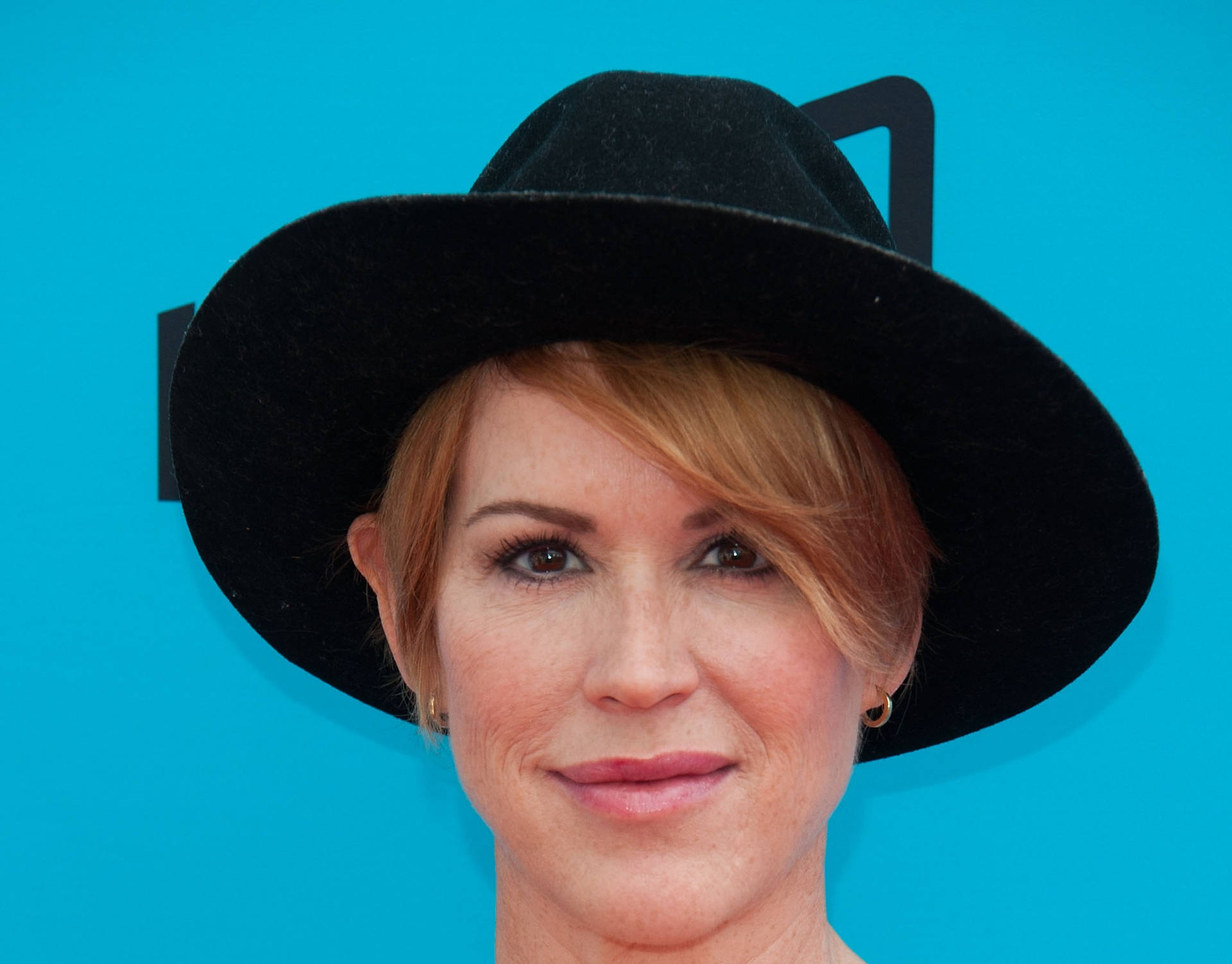 Molly Ringwald Big Black Hat Background