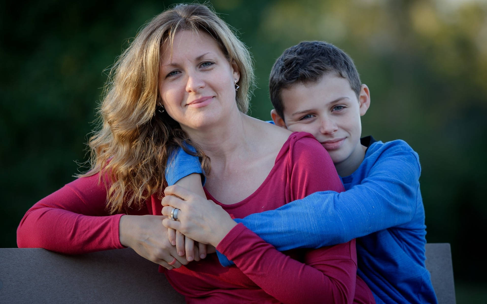 Mom And Son Hugging Background