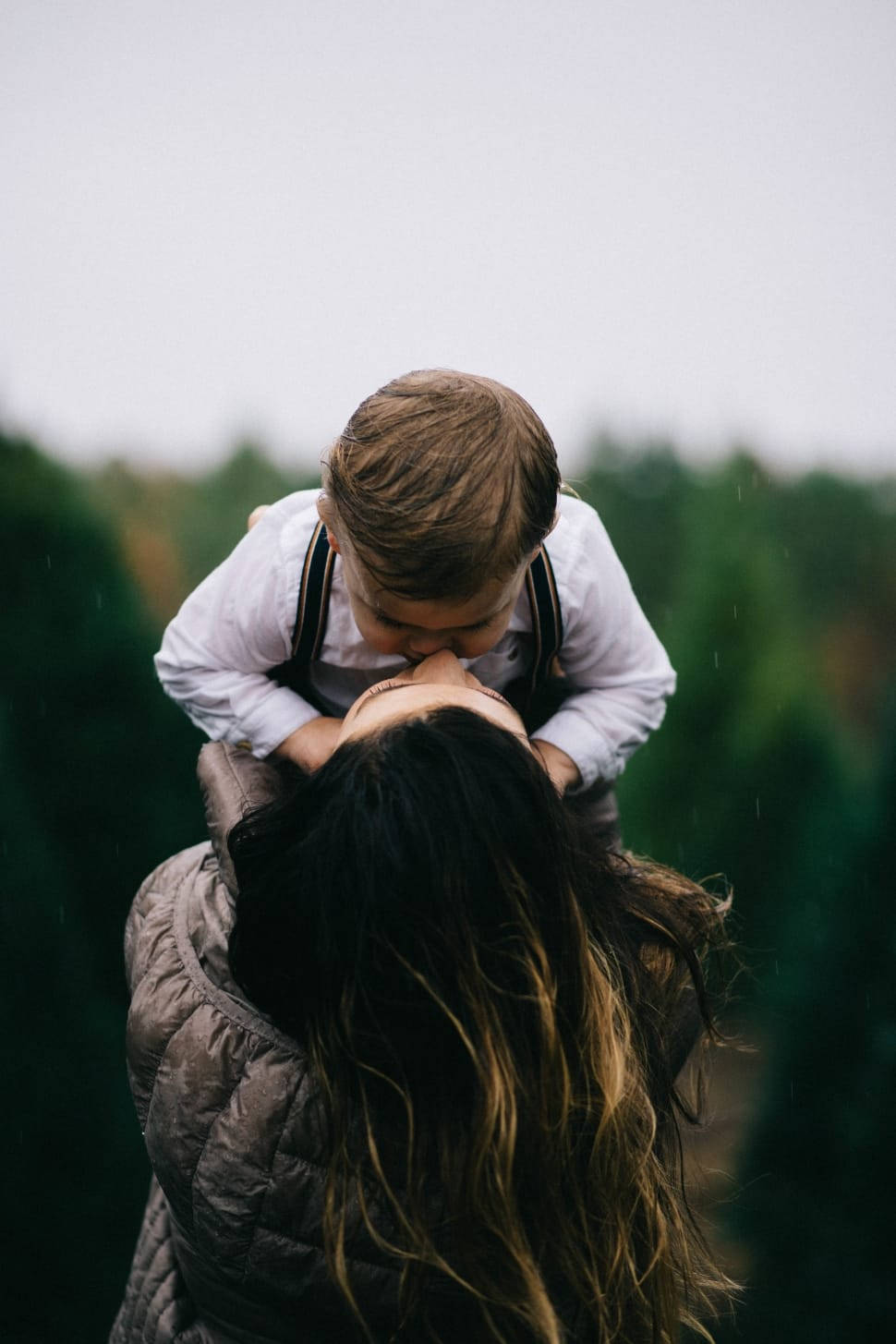 Mom And Son Kiss For Phone