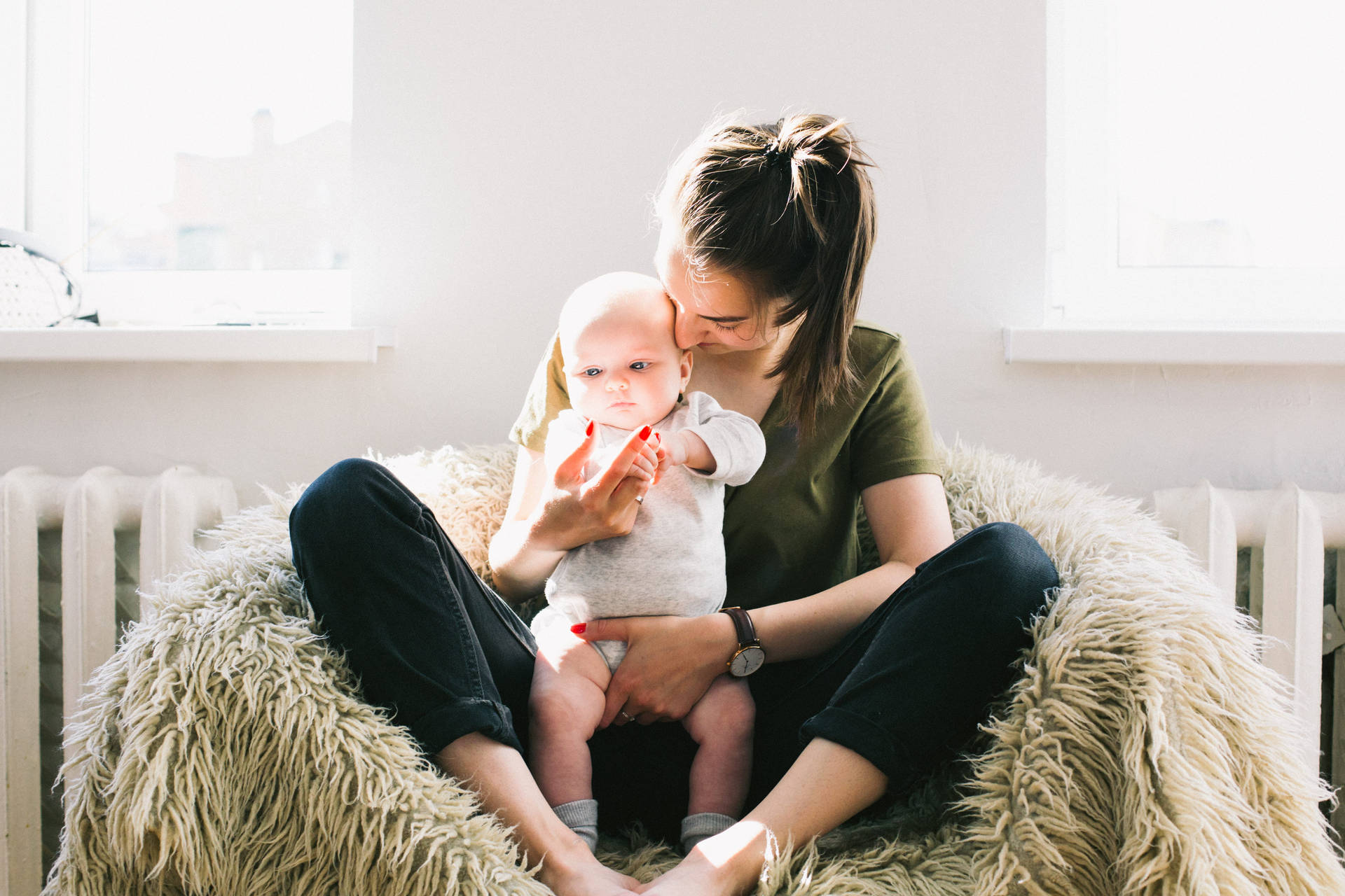 Mom And Son Sitting On Couch