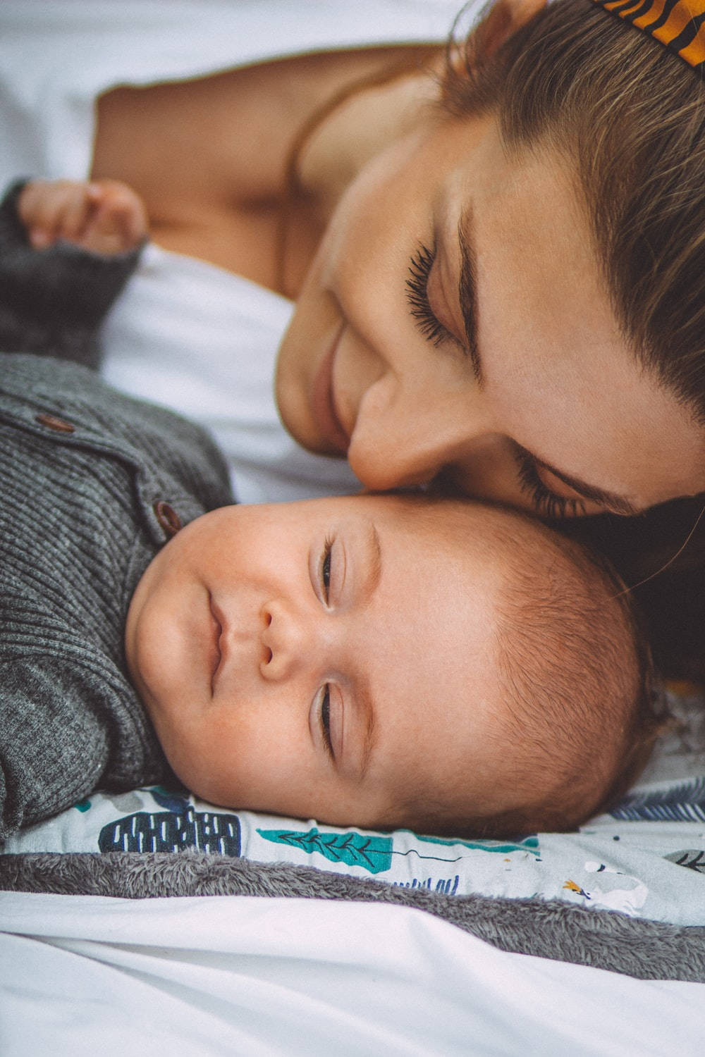 Mom And Son Smiling And Sleeping