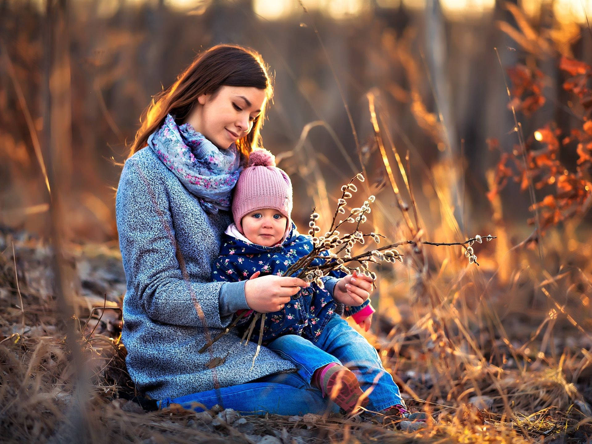 Mom And Son With Flowers Background