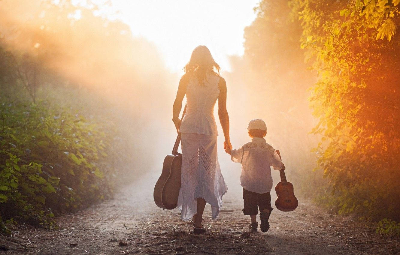 Mom And Son With Guitars Background