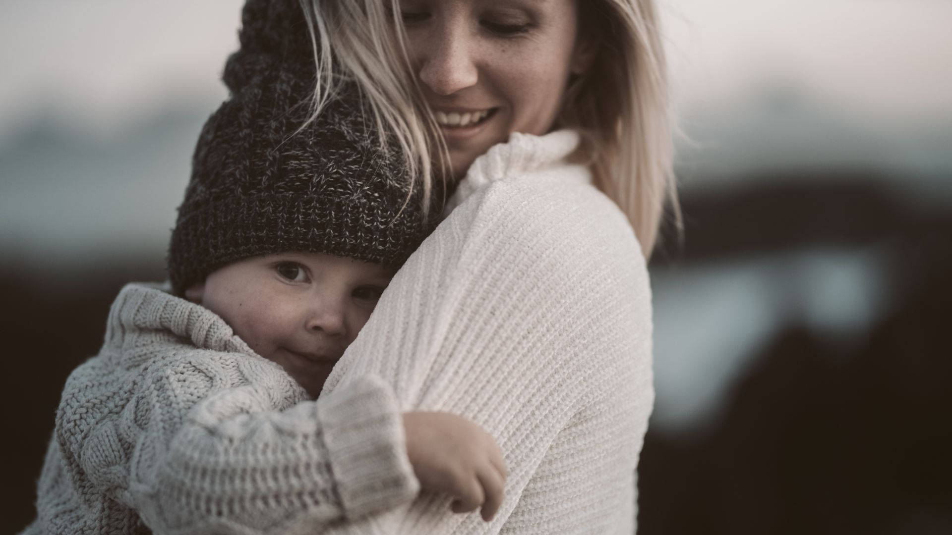 Mom Carrying Baby Background