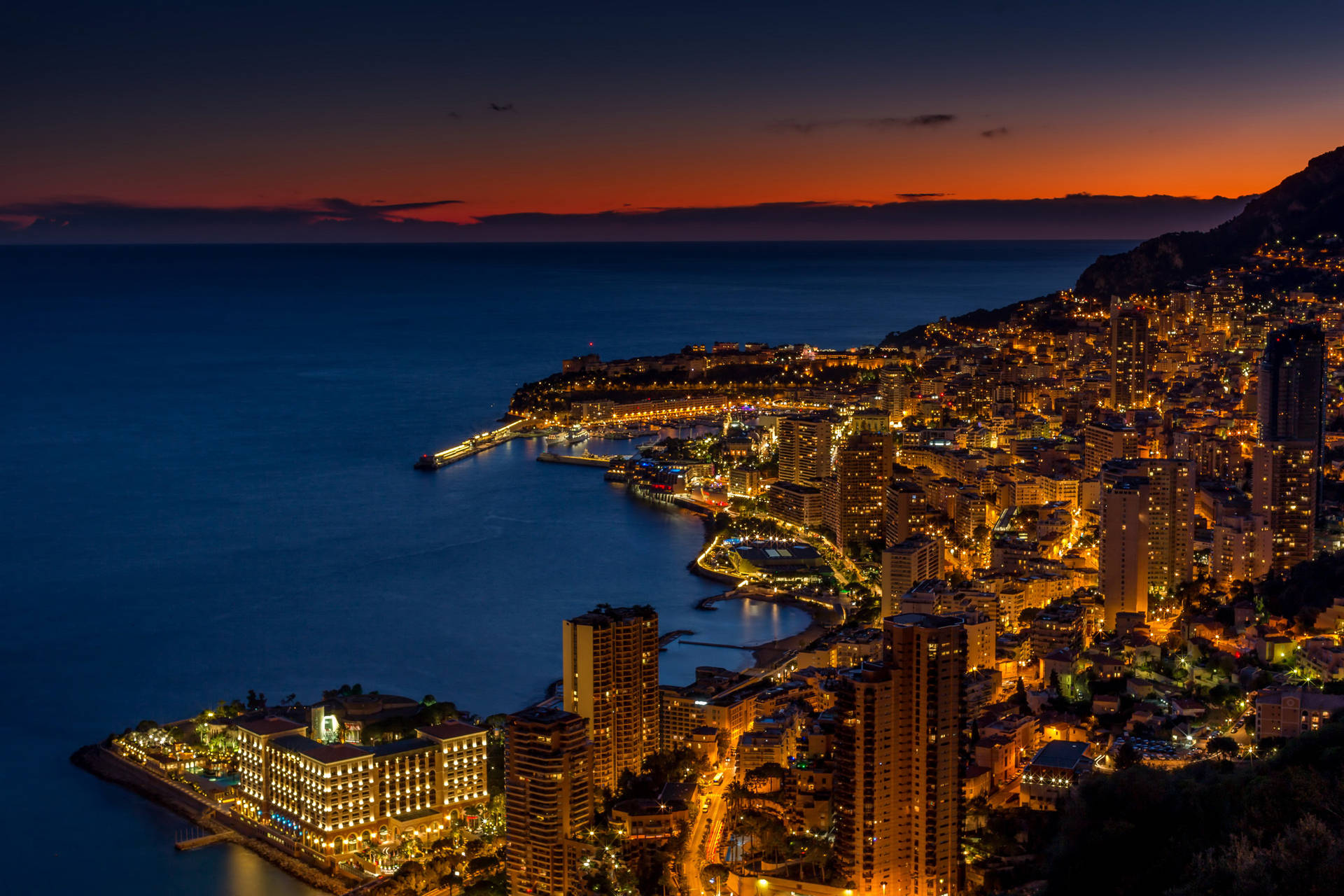 Monaco Glowing In The Dark Background