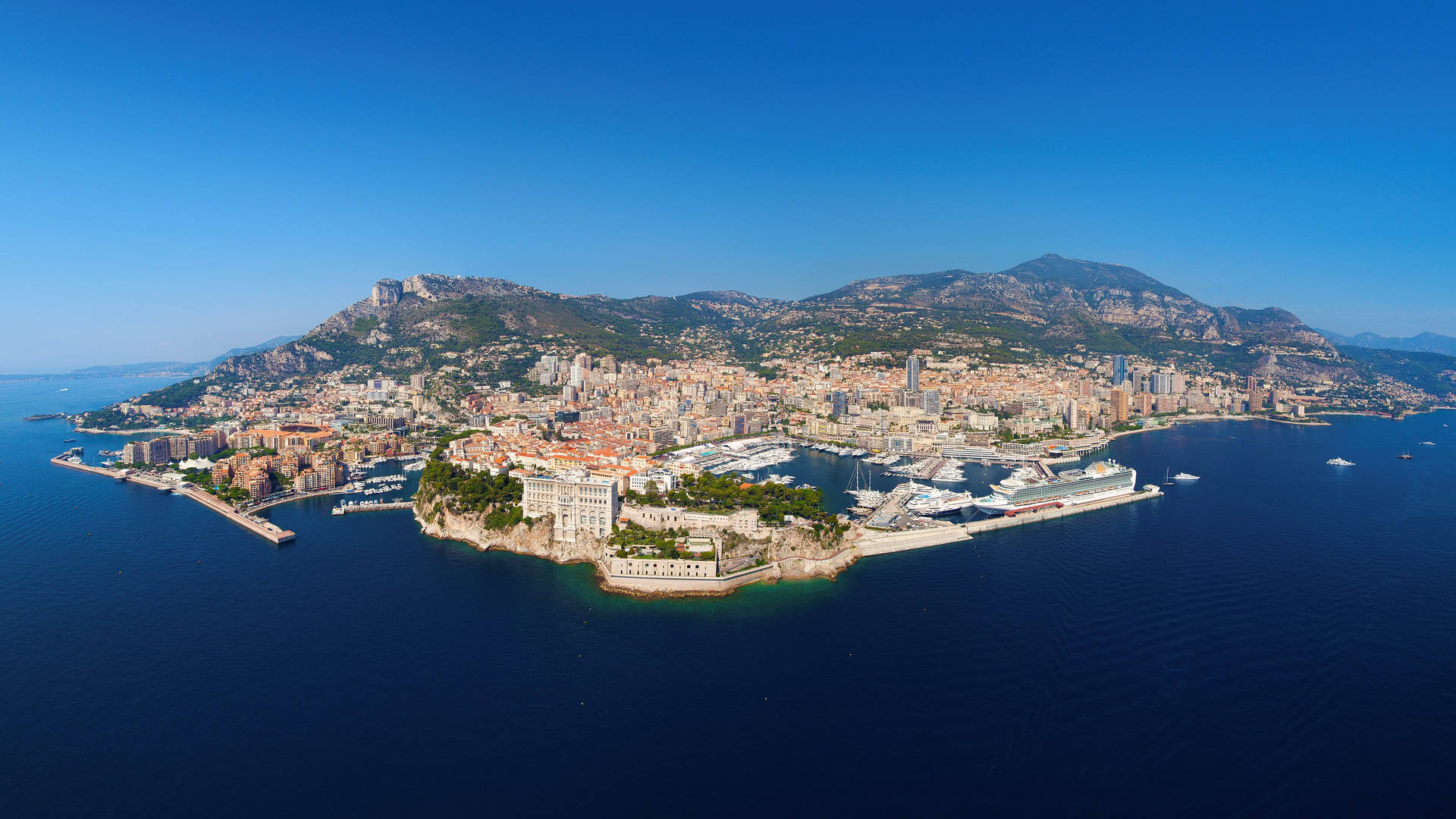 Monaco Surrounded By Water Background