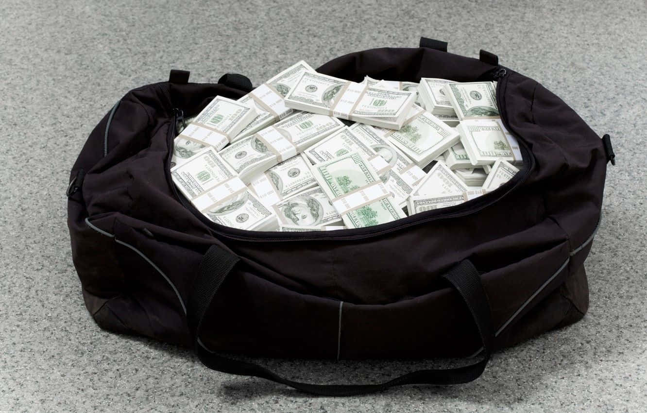 Money Bag Stuffed With Dollar Bills Background