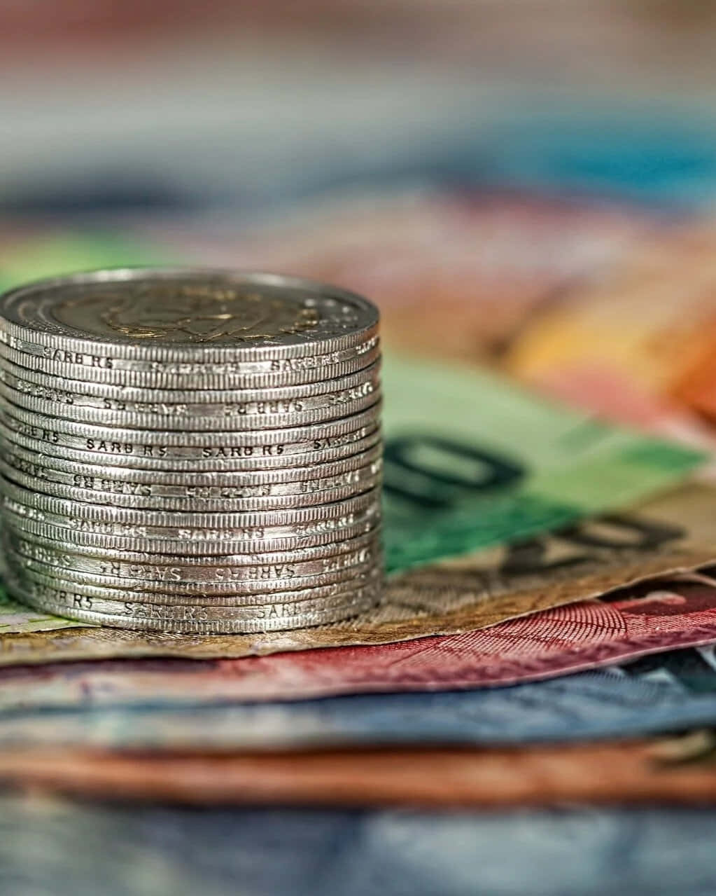 Money Paper And Stacked Coins Background