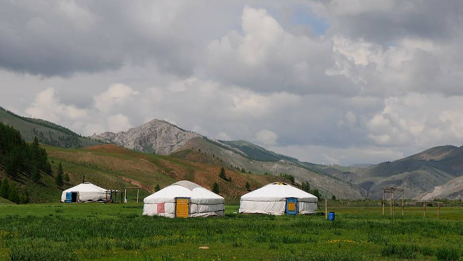 Mongolias Yurts In Mountains Background