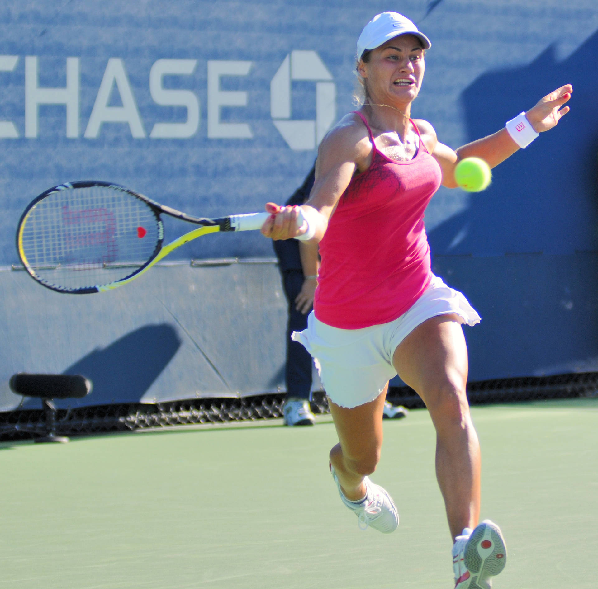 Monica Niculescu Chasing Ball Full Body Background