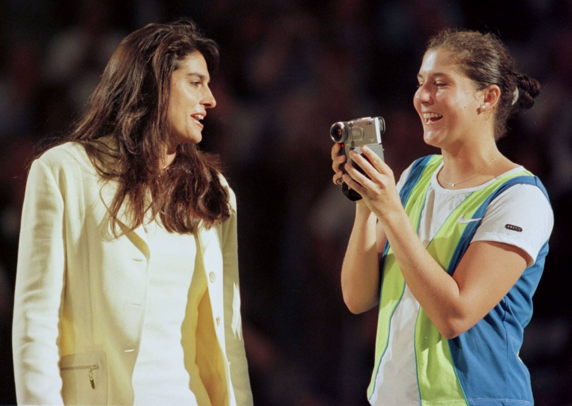 Monica Seles Filming And Laughing Background