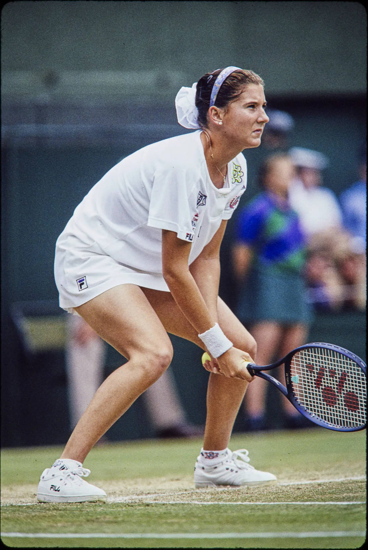 Monica Seles Serious Expression During Game Background